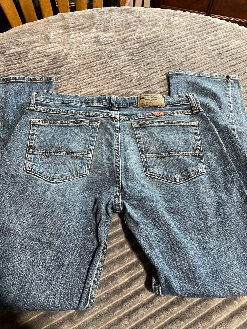 Wrangler Slim Straight Blue Jeans with Gold Stitching